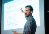 Professor Zachary Hartwig addresses undergraduate nuclear engineering students in their program’s capstone course