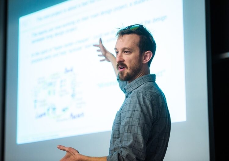 Professor Zachary Hartwig addresses undergraduate nuclear engineering students in their program’s capstone course